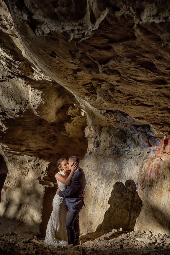 pretty girl, handsome, man, shadow, kiss, hugging, canyon, rock, cave, cliff