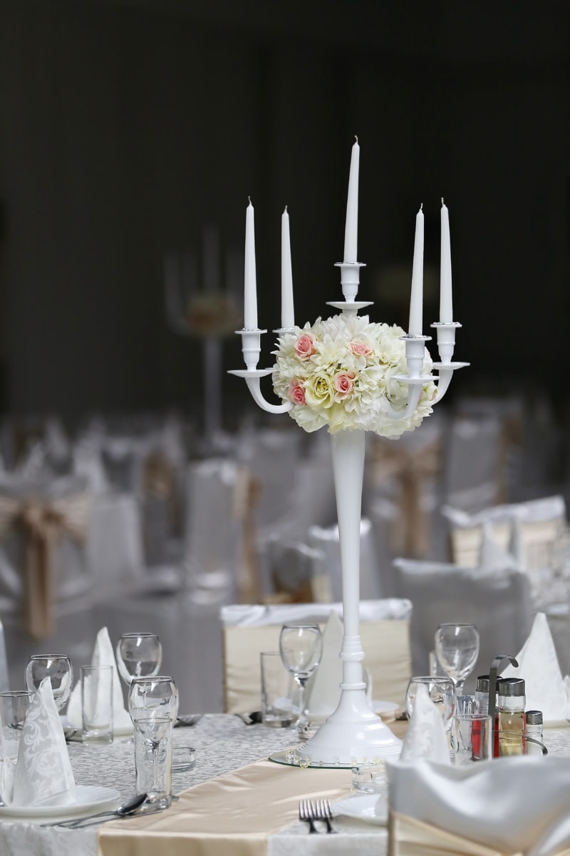 white, tall, candlestick, hotel, bouquet, wedding venue, elegant, reception, table, candle
