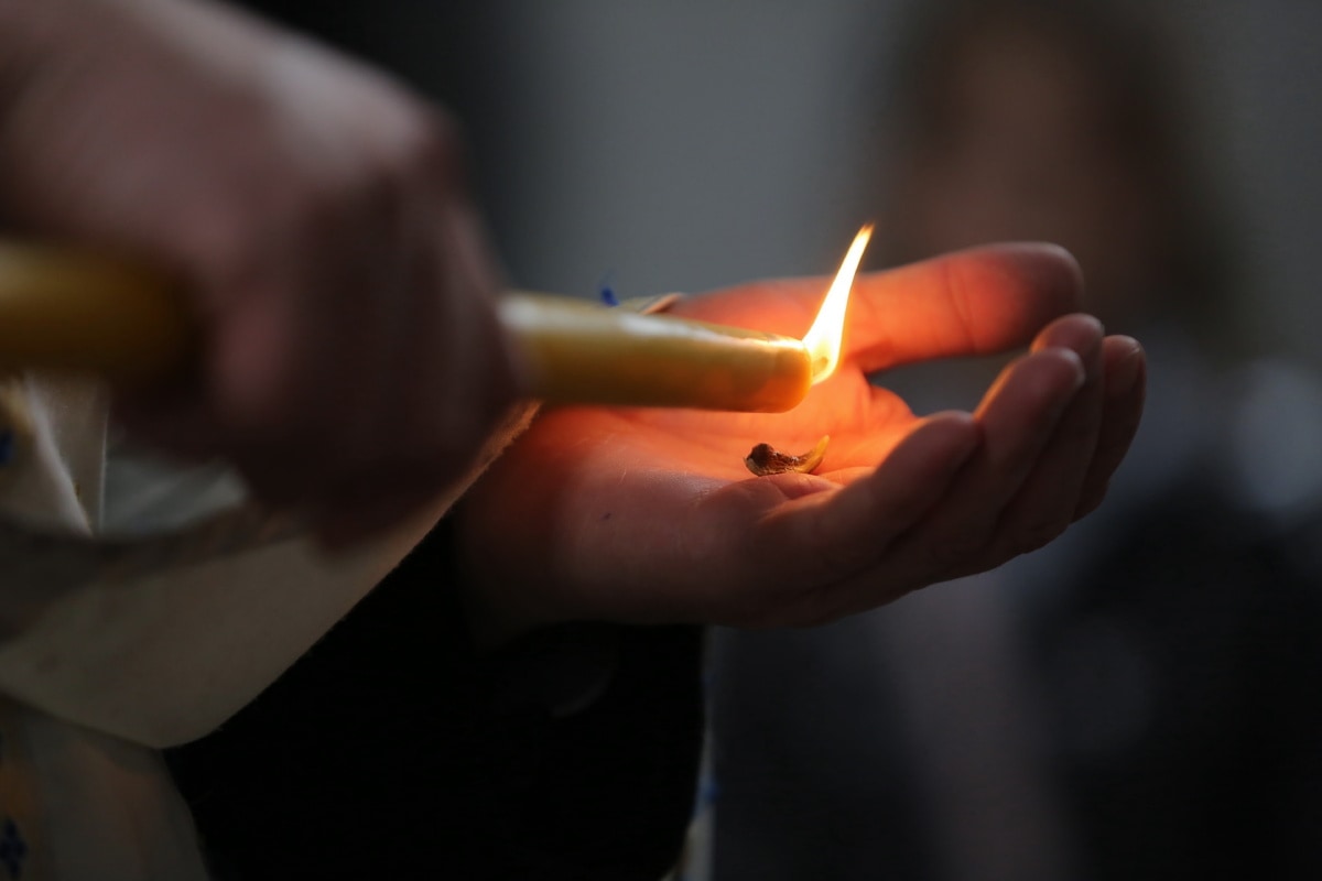 candle, candlelight, flame, priest, ceremony, hands, stick, blur, smoke, man
