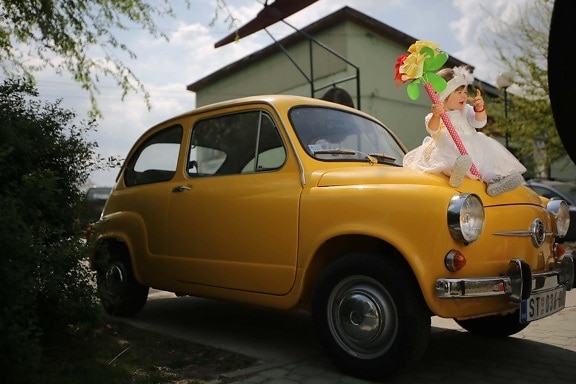 Volkswagen beetle, baby, toddler, pretty girl, nostalgia, oldtimer, car, orange yellow, transport, automobile, vehicle