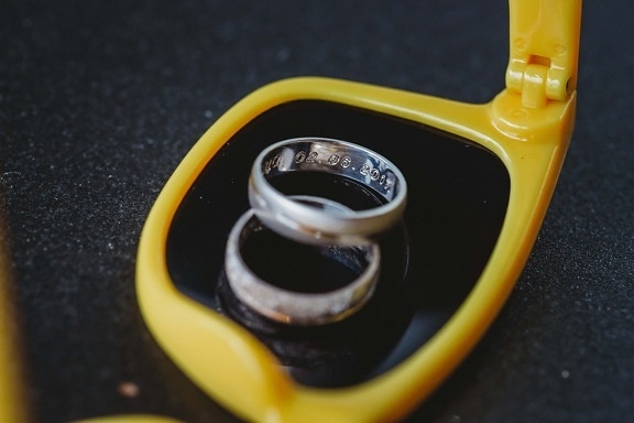 date, number, wedding ring, rings, carvings, plastic, still life, blur, close-up, detail