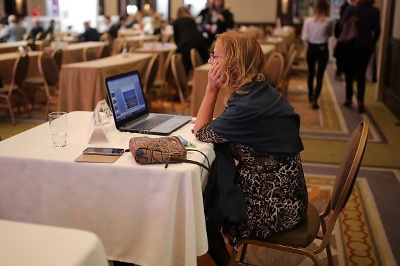 conference, businesswoman, laptop computer, woman, computer, office, laptop, table, indoors, furniture