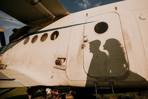 silhouette, boyfriend, girlfriend, airport, aircraft, propeller, aircraft engine, shadow, vehicle, airplane