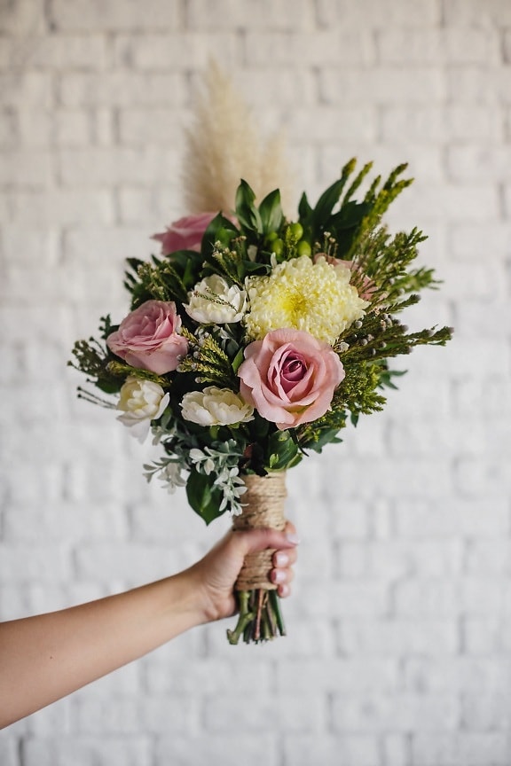 bouquet, arrangement, hand, white, bricks, wall, flowers, nature, decoration, leaf