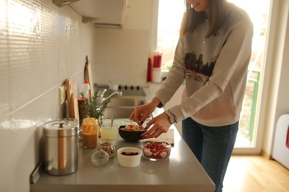 preparation, healthy, breakfast, banana, muesli, berries, young woman, domestic, indoors, cooking