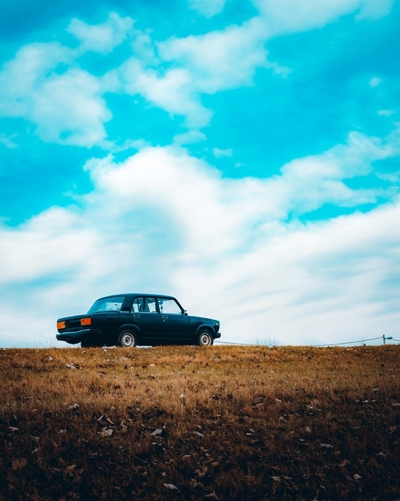 sedan, car, hilltop, blue sky, field, countryside, rural, meadow, vehicle, landscape