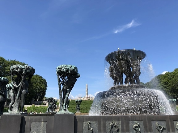 fountain, sculpture, bronze, statue, architecture, water, outdoors, art, monument, park