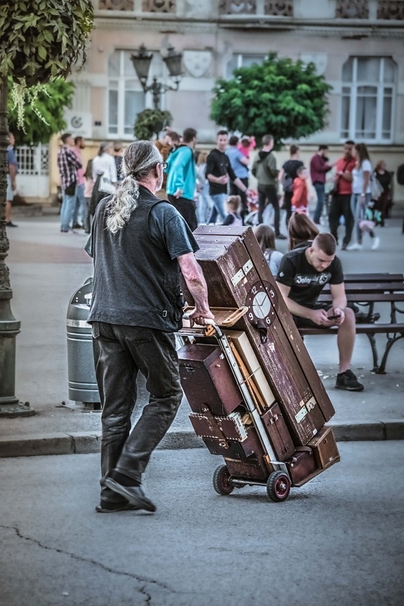 man, baggage, carrier, people, street, city, group, urban, many, tourist