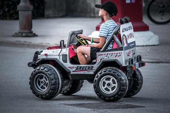 playful, playing, boy, driving, driver, toy, jeep, street, vehicle, wheel