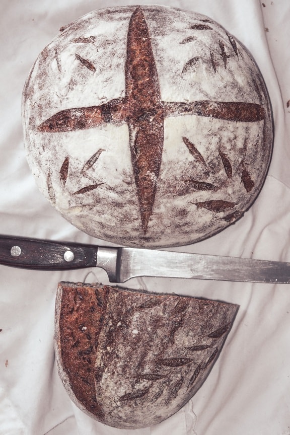 knife, kitchen table, wholemeal bread, bread, baked goods, lunch, cutter, food, tool, crust