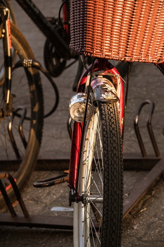 bicycle, headlight, dynamo, wicker basket, parking lot, bike, vehicle, tire, outdoors, biker