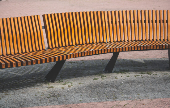 furniture, bench, empty, street, sidewalk, pavement, seat, wood, park, outdoors