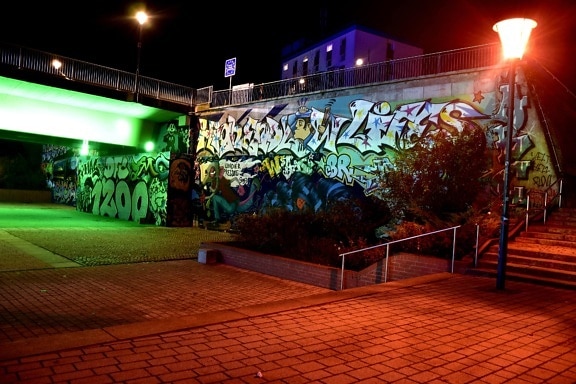 graffiti, urban area, night, street, bridge, patio, walkway, light, city, architecture