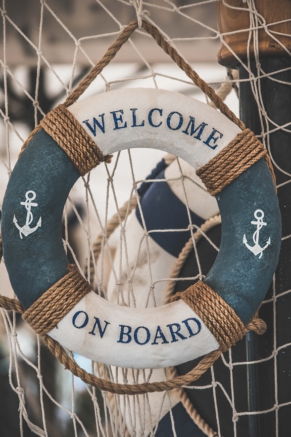 sign, welcome on board, life preserver, text, vintage, interior decoration, still life, hanging, rope