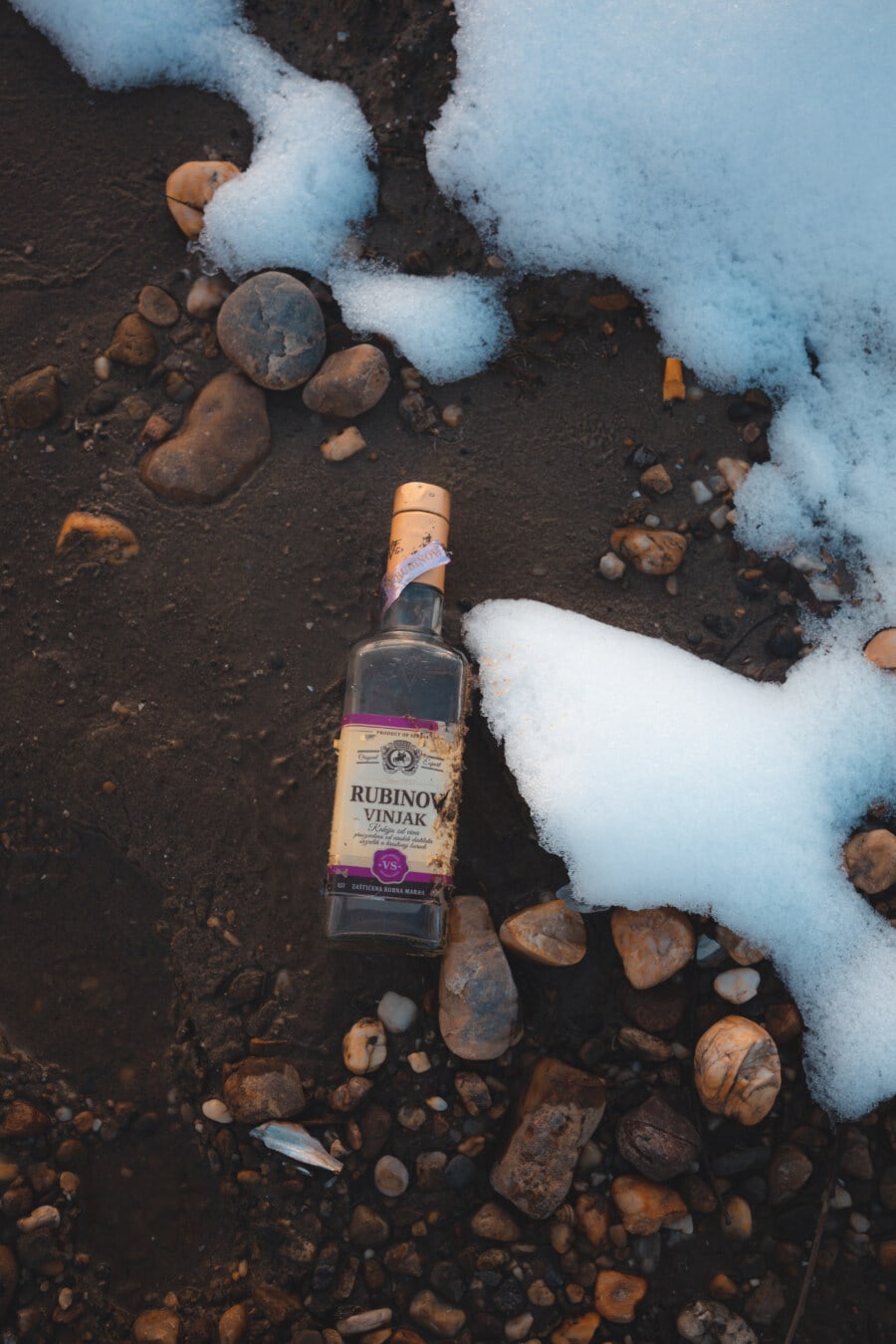 bottle, alcohol, garbage, ground, snowy, wet, sand, winter, snow, cold