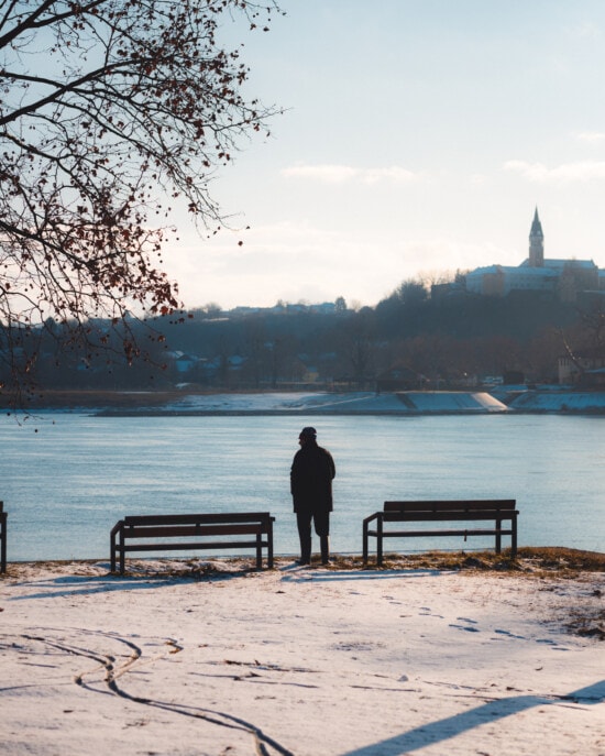 old man, pensioner, riverbank, winter, bench, jacket, alone, walking, water, landscape