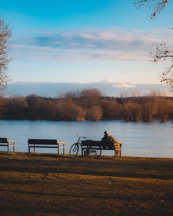 old man, relaxing, bench, sitting, riverbank, bicycle, person, alone, shore, lake