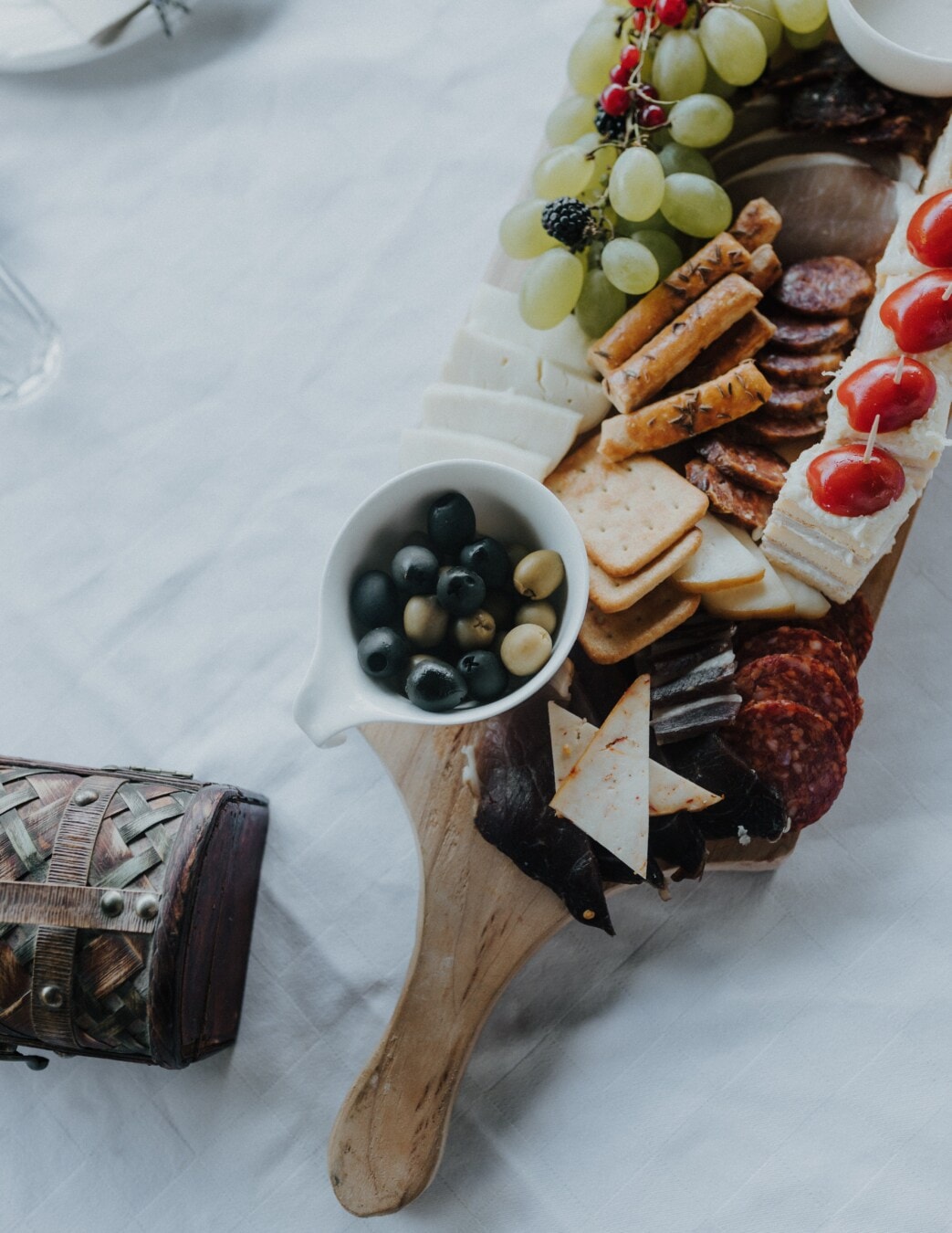 olive, grapes, food, fruit, snack, sausage, appetizer, cheese, baked goods, still life