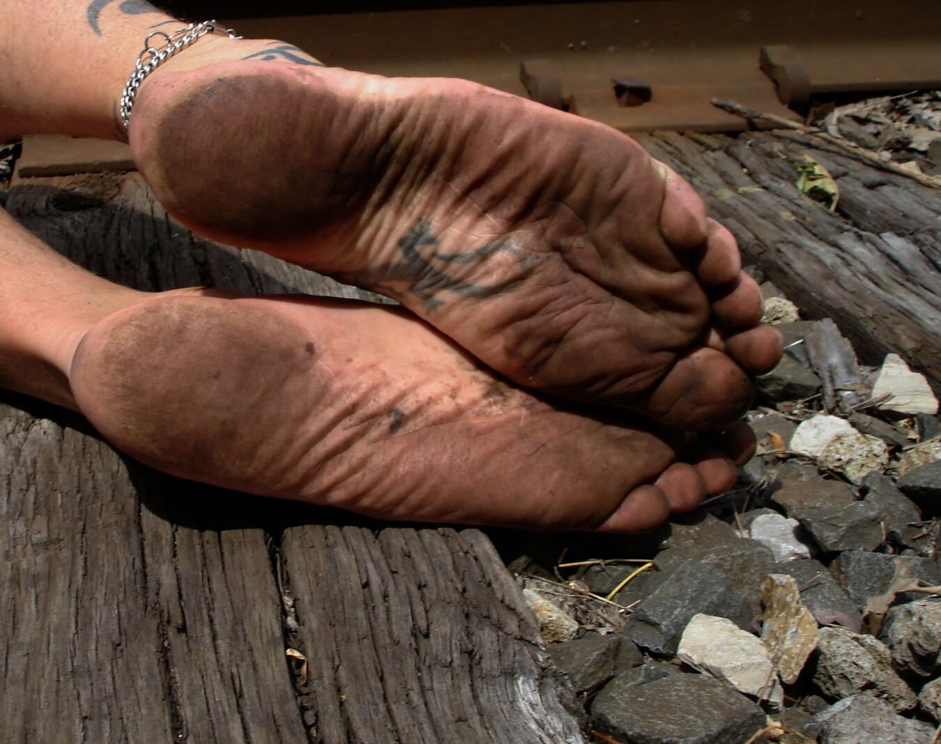 feet, dirty, barefoot, tattoo, legs, railroad, close-up, outside, rocks, foot