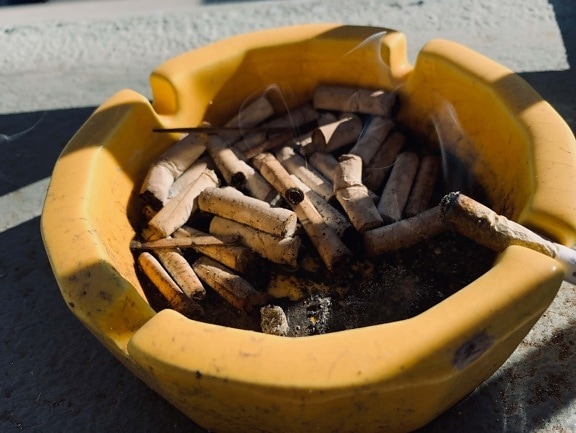 cigarette, ashtray, smoke, tobacco, ash, filter, trash, garbage, dirty, brown