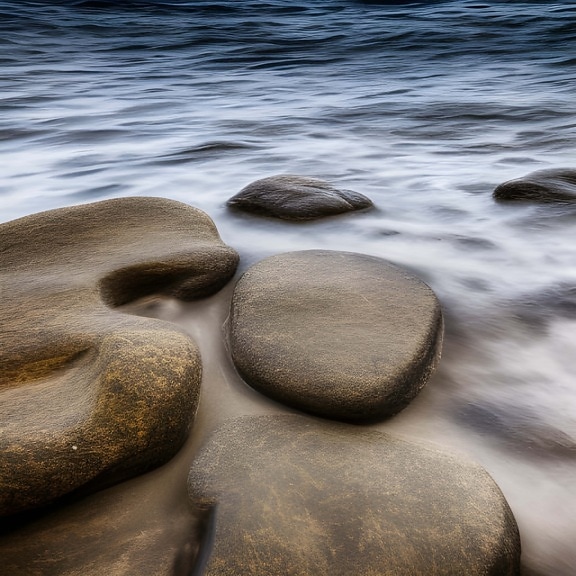 Rocks in the Ocean, artificial intelligence AI generated photo