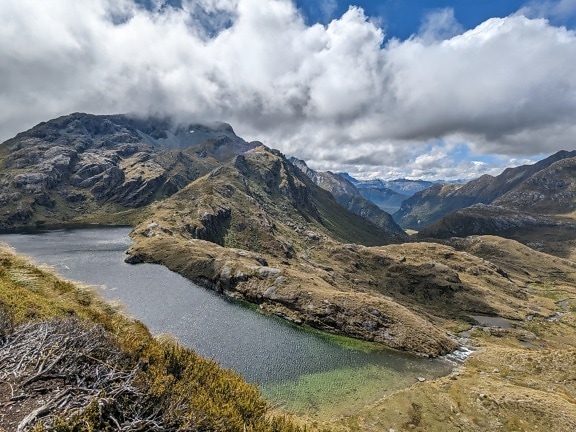 Small pond at the top of mountains in national park of New Zealand