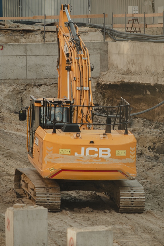 Big bulldozer working on construction site