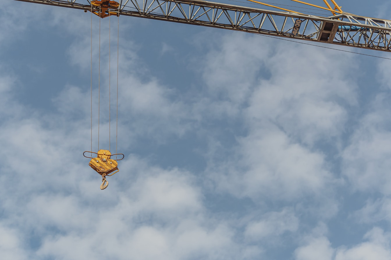 Big cast iron hook on industrial crane