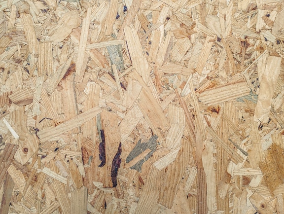 Chipboard plank surface close-up wooden texture