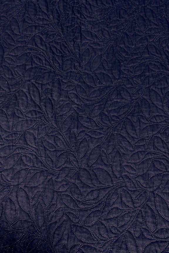 Dark blue cotton canvas with flower ornament