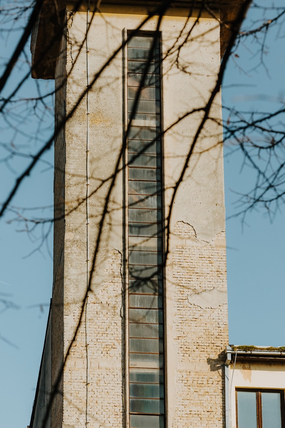 Old decay tower with tall windows