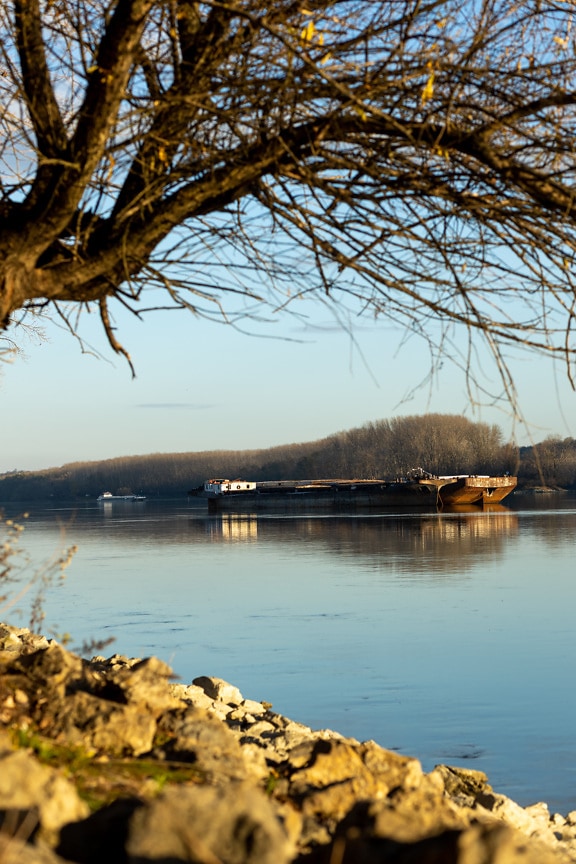 Big cargo ship sailing on Danube river