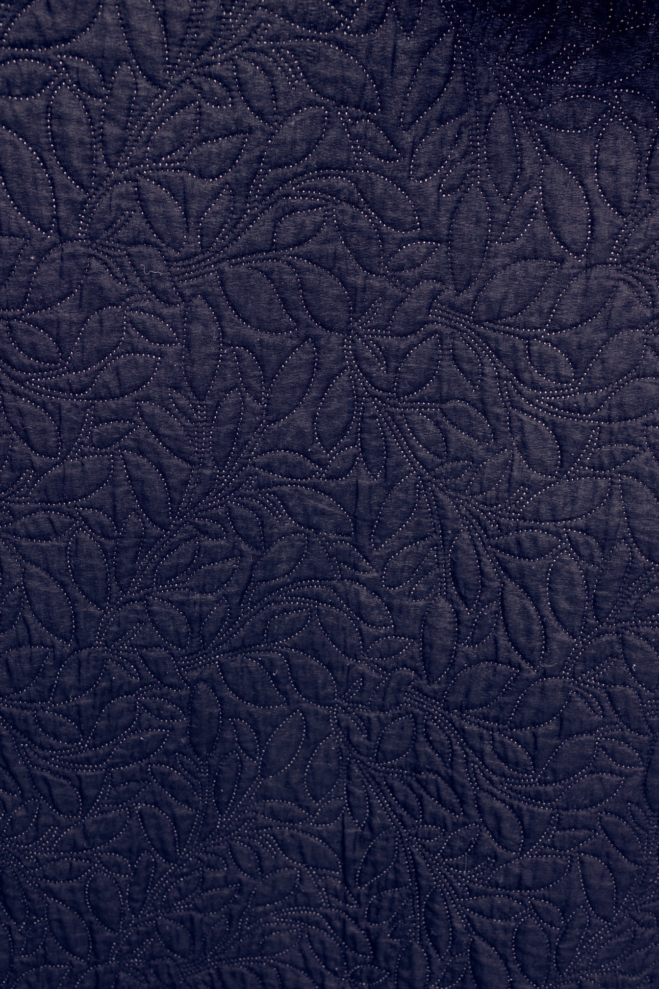 Vải cotton màu xanh đậm với trang trí