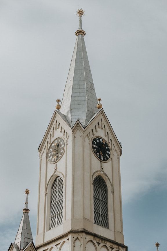 Reform Christian church tower with and analog clock