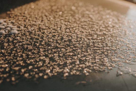 Close-up of ice crystal texture melt on sunrays