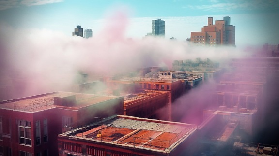 Multicolored roofs in smog create a breathtaking panorama photomontage