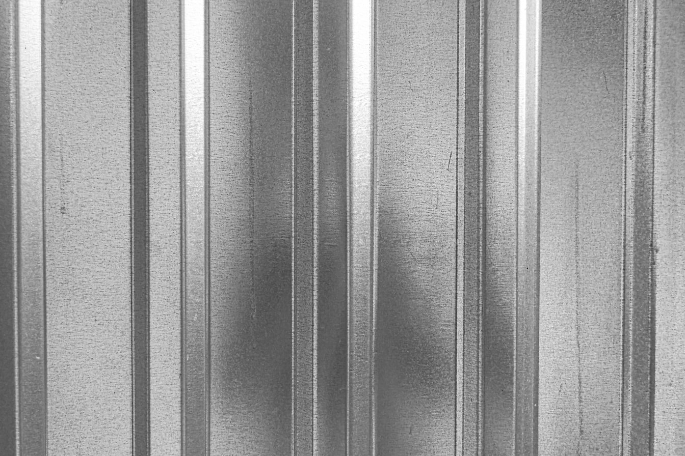 Glänsande glänsande metallisk textur med vertikala linjer