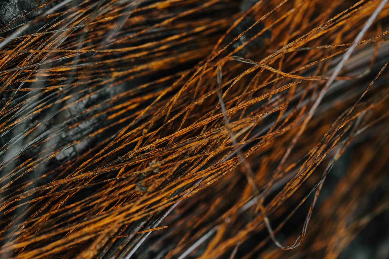 De textuur van de close-up van roestige ijzer bruine draden
