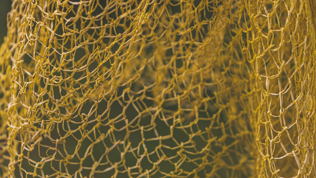 Sieťová textúra priehľadného nylonového plastu z polyesteru