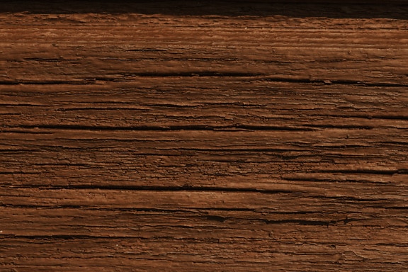 Peinture brun clair sur texture de planche de bois dur rugueux