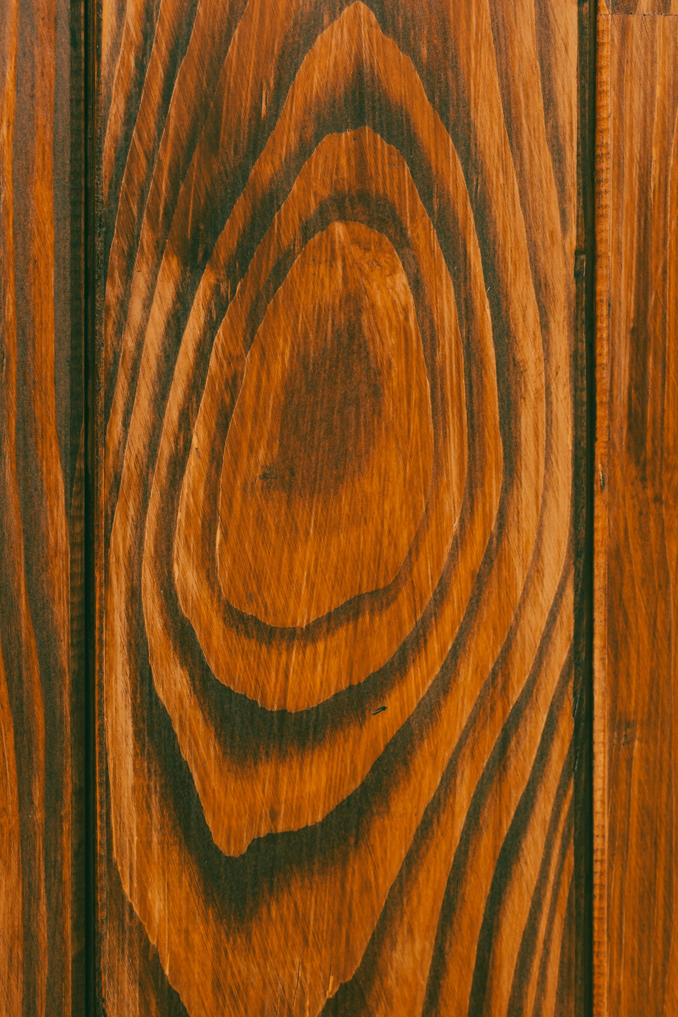 Texture de planche en gros plan de coupe transversale de noeud en bois