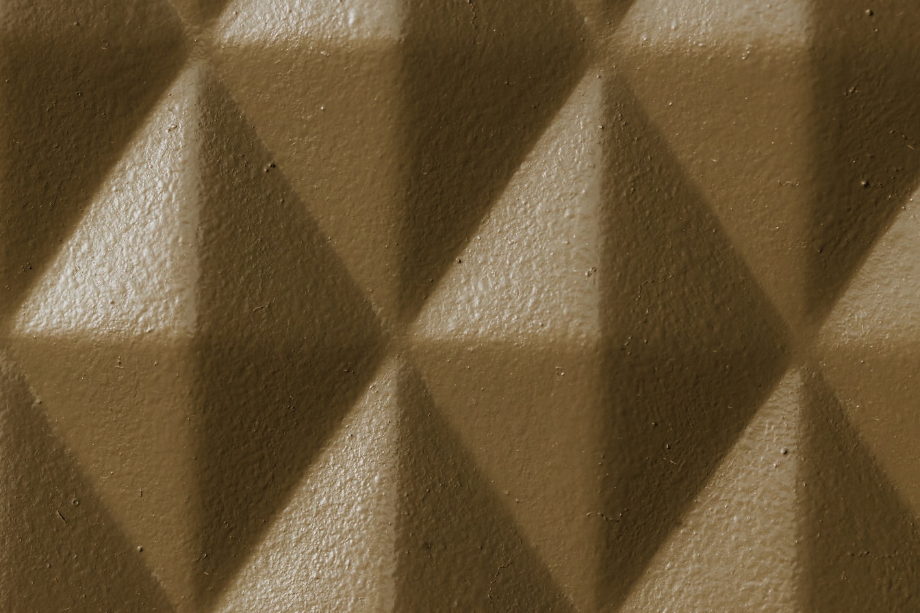 Vaaleanruskea metallirakenne rombigeometrisella kuviolla