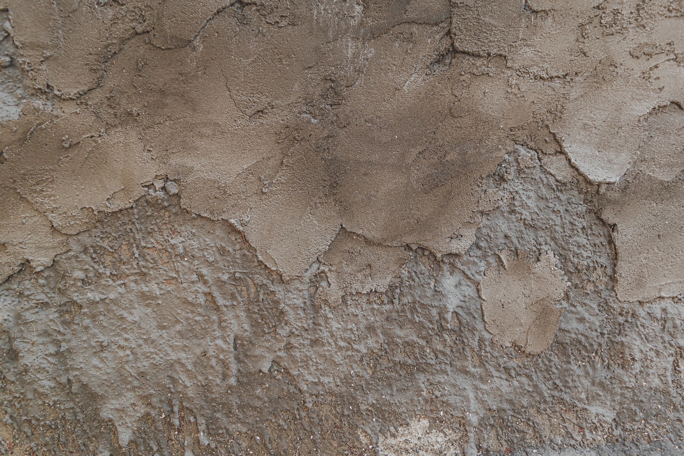 Szorstka tekstura zaprawy cementowej na ścianie grunge