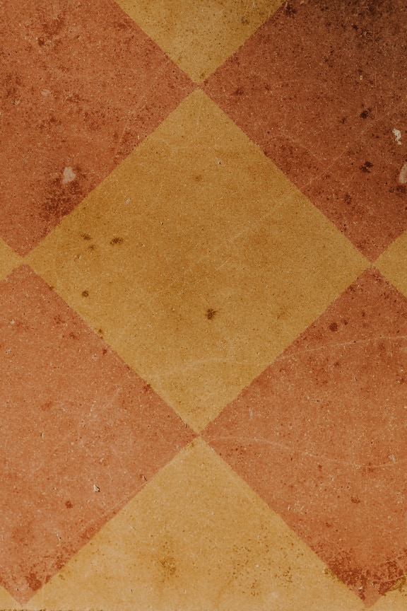 Orange yellow rectangle rhomb pattern on old vintage tiles