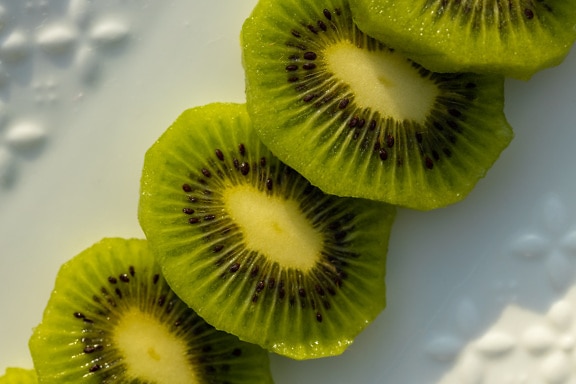 Slices of fresh organic kiwi fruit close-up
