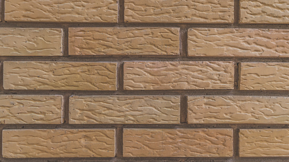 Textura de parede de tijolo marrom claro com alvenaria horizontal