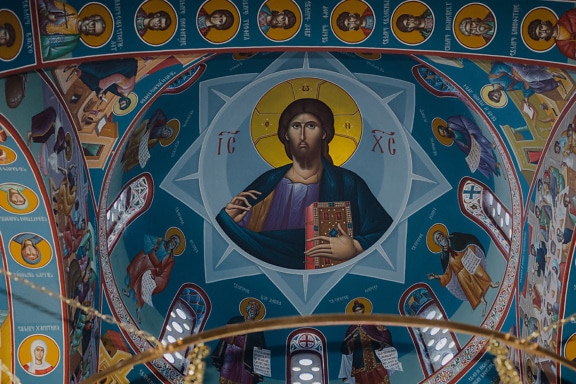 Mural of Jesus Christ on ceiling in orthodox church in Byzantine style