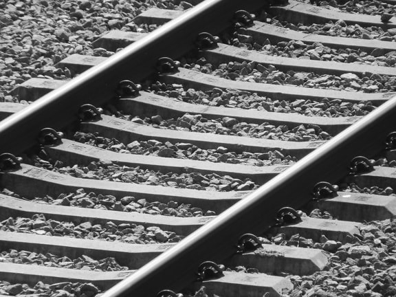 Close-up of railroad cast iron tracks monochrome photo