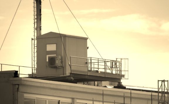 Rooftop of industrial facility with terrace sepia