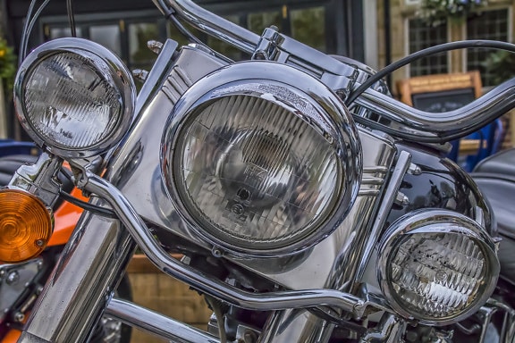Harley Davidson motorcycle with chrome metallic headlight